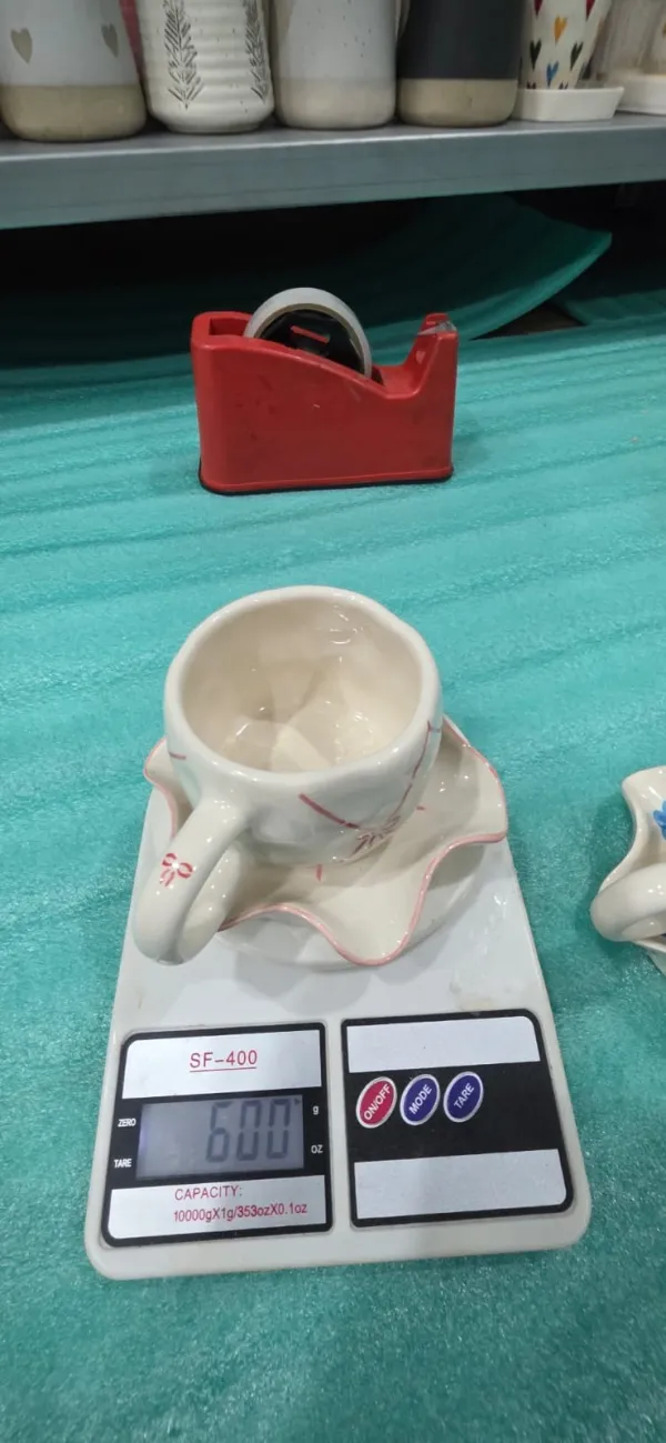 "Ruffle" Hand-Molded Cup & Saucer Set hover